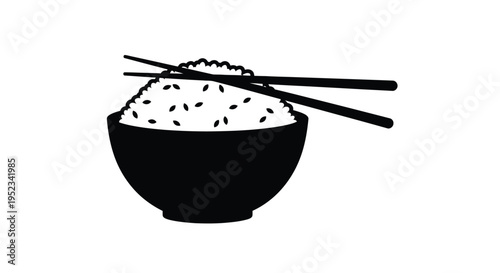 A black bowl of rice with chopsticks a striking silhouette
