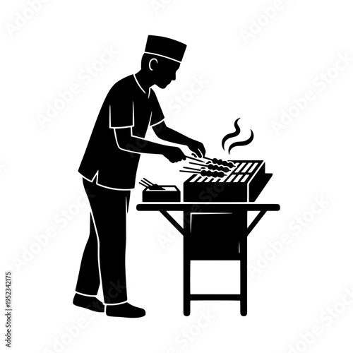 A black and white vector silhouette of a street food vendor grilling satay skewers on a charcoal grill, representing traditional Asian cuisine and culture.