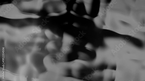 Abstract swirling smoke patterns in monochrome, evoking a sense of mystery and movement