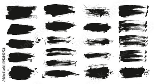 Collection of diverse black paint brush strokes and textures on a clean white