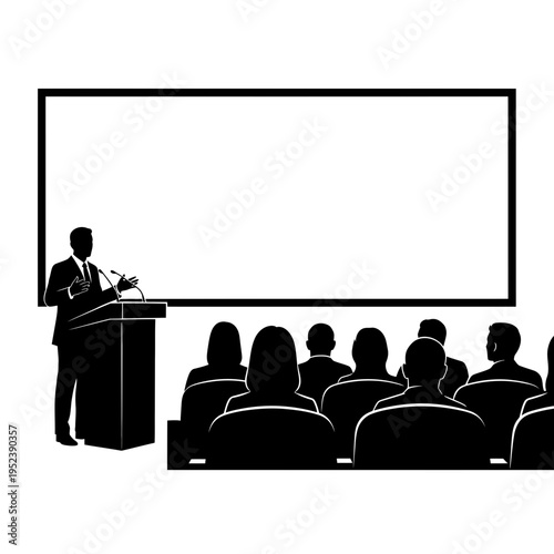 Man Giving Presentation to Audience in Auditorium.