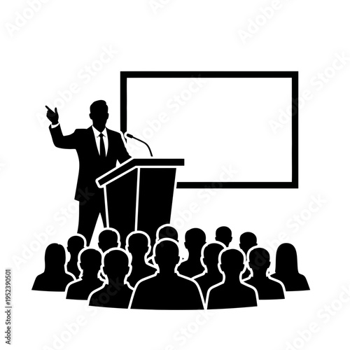 Man Speaking at Podium to Audience.