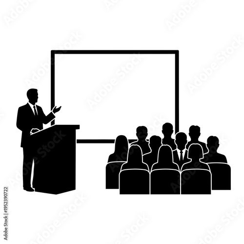 Man Presenting to Audience at Podium.