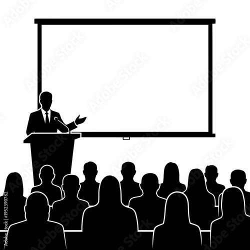 Businessman presenting to audience at conference.