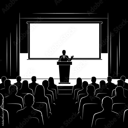 Man Giving Presentation to Audience in Theater.