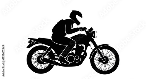 Biker wearing helmet rides motorcycle on road with speed and motion