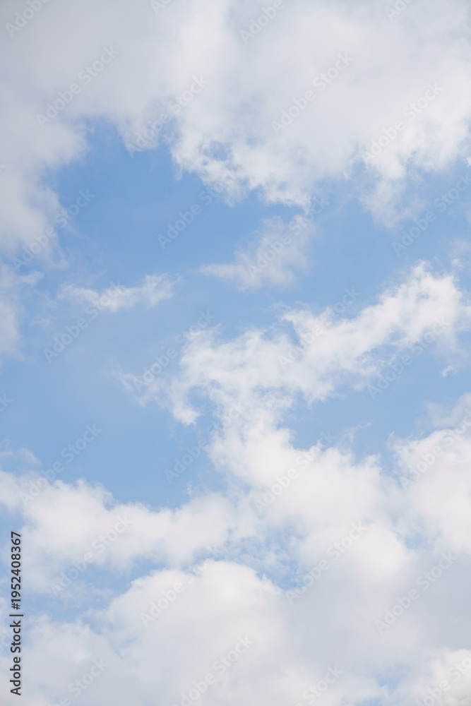 Fototapeta premium Bright sky with white clouds on a sunny day
