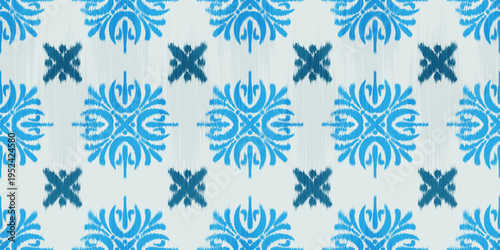 Ikat seamless pattern with floral ethnic motif. Geometric rug textured batik print for textile background. Traditional tribal oriental woven ornament. Decorative grunge illustration