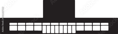 Black silhouette of single story school building or educational institution with windows and door