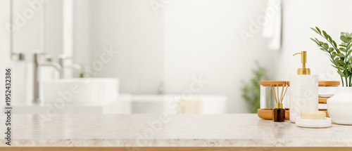Foto Soap and body wash and diffuser on white marble counter table across tub and sin