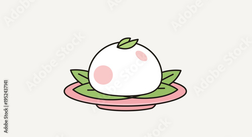 Cute mochi dessert with pink blush and green leaves on a pink plate