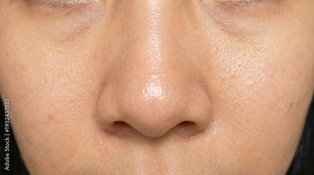 Fototapeta premium Oily facial skin texture and pores in macro closeup portrait