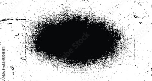 A black circular smudge on a white textured background with scattered dark specks