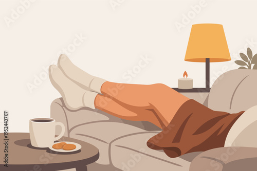 Woman's legs with socks on a sofa, enjoying coffee, cookies, and candle glow, creating a hygge moment