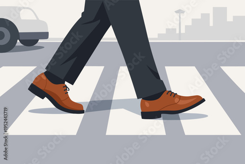 Business person's legs and feet with brown shoes walking on a marked crosswalk, with a car and city skyline in background