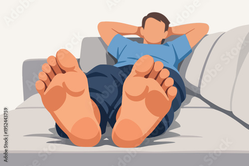 Man finding ultimate relaxation by reclining on a sofa, putting feet up, and resting comfortably at home