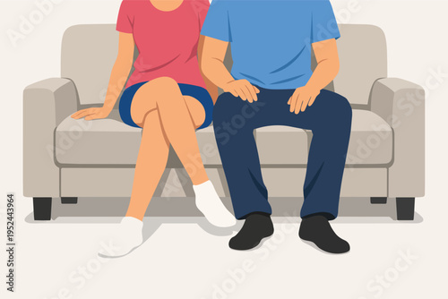 Couple relaxing together on sofa at home, enjoying leisure time and comfortable relationship proximity