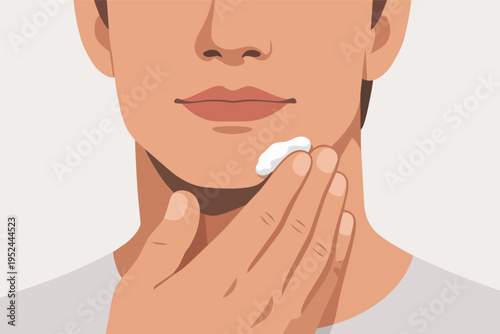 Man applying face cream to his face, performing a daily skincare treatment for hydration and grooming hygiene