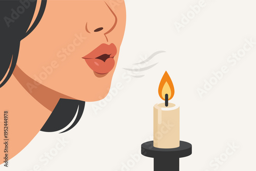 Woman blowing out candle flame making a wish for birthday celebration or hopeful future concept