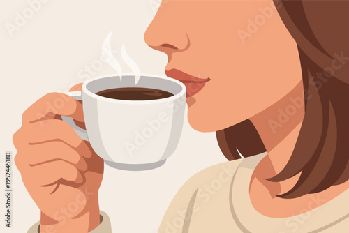 Woman enjoying a hot coffee or tea, smelling the fresh aroma from a steaming cup held in hand