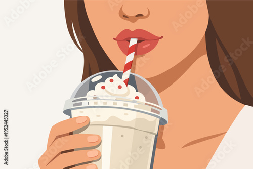 Woman holding and drinking a creamy milkshake with a striped straw. Refreshing sweet drink for summer