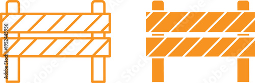 Orange construction barriers with diagonal stripes