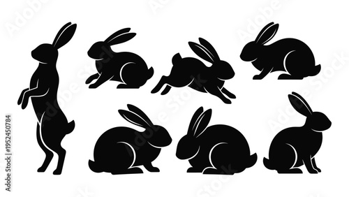 A collection of black silhouette rabbits in various poses and positions