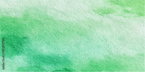 Vibrant watercolor wash background with blend of cool greens, soft textures and artistic strokes. 