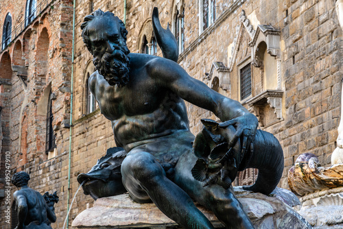 Bronze satyr statue on the Fountain of Neptune in Piazza della Signoria, Florence, Tuscany, Italy