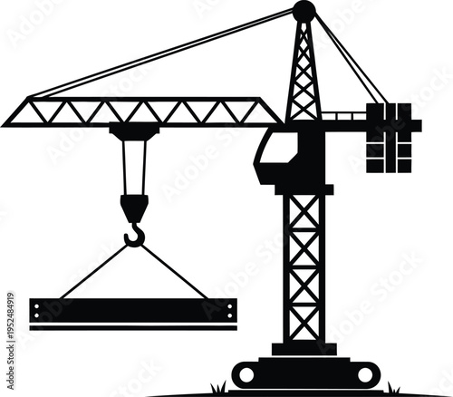 Construction crane with suspended load in industrial setting