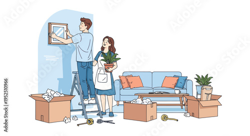Couple Decorating New Home, Hanging Picture Frame on Wall, Moving Boxes