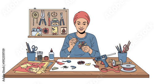 Creative person crafting intricate decoration with tools and supplies on workbench