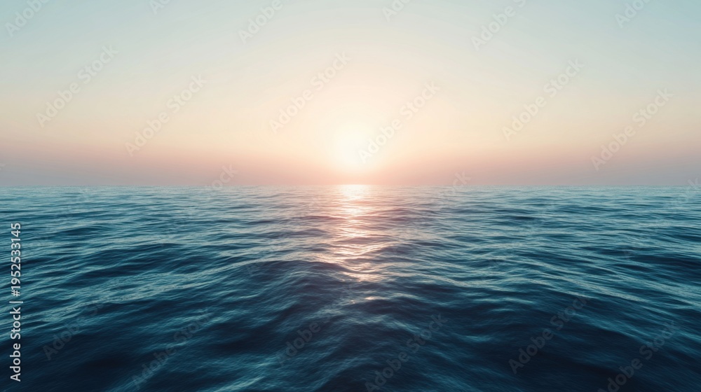 Obraz premium Soft Horizon Glow Over Calm Ocean Water At Sunset
