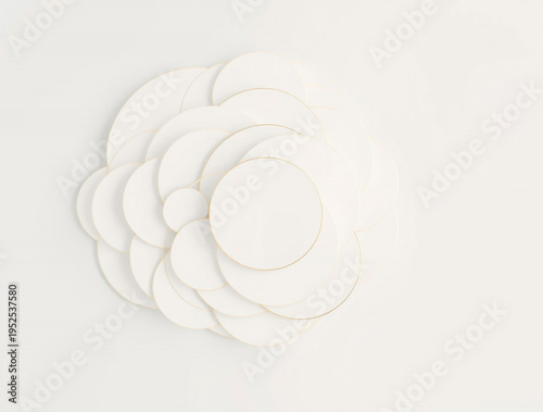White paper circles layered to form a stylized camellia flower shape on a white background