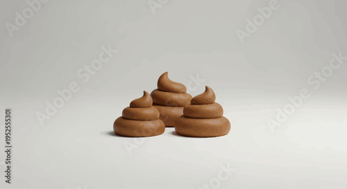 Three brown chocolate poop piles.
