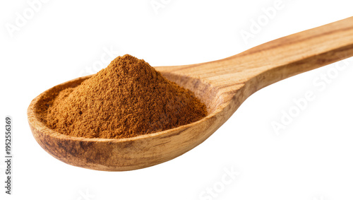 Isolated rustic wooden spoon filled with a mound of ground aromatic spice powder.