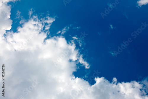 Gray rain clouds and blue sky in summer day.