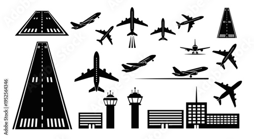 Airplanes on airport runway and buildings.