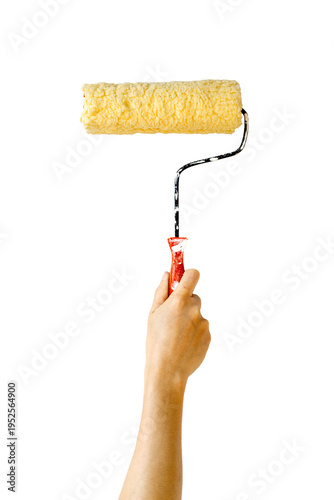 A hand holding a horizontal paint roller loaded with cream-colored paint, isolated against a solid white background, perfect for home renovation or DIY concepts.
