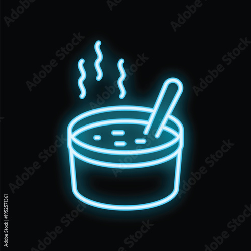 Neon sign illustrating a bowl of hot soup steaming with a spoon