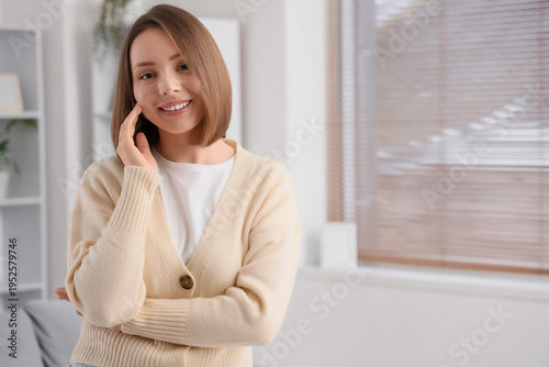Free Download Beautiful young woman with short hair at home - GFXLoad