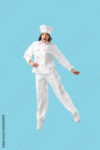 Shocked female chef jumping...