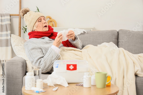 Sick elderly woman with tis...