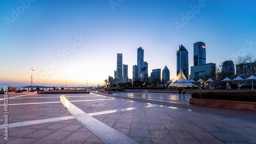 Seaside Cityscape at Dusk with Modern Skyscrapers