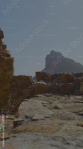 Vertical video: Cam panning, ruins framing sea and mountain, finance graphs rising for insight