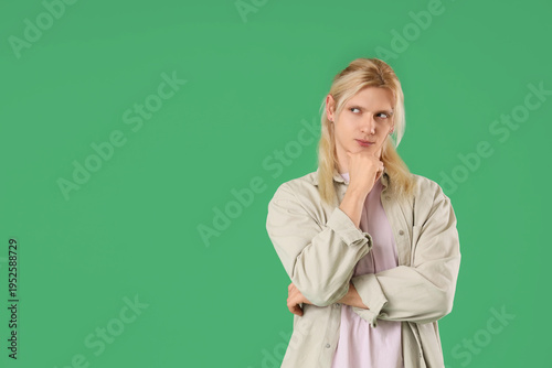 Thoughtful young blonde man...