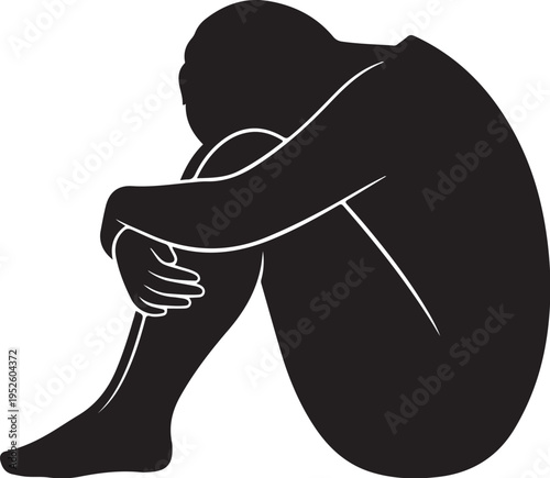 Sad person sitting alone in depression and sorrow concept