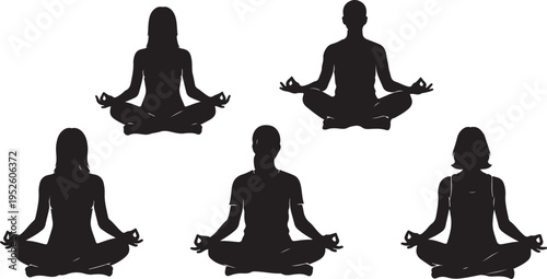 Silhouettes of people meditating in yoga poses together peacefully