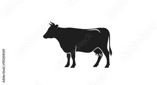 Black silhouette of a cow standing.
