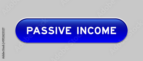 Blue color capsule shape button with word passive income on gray background